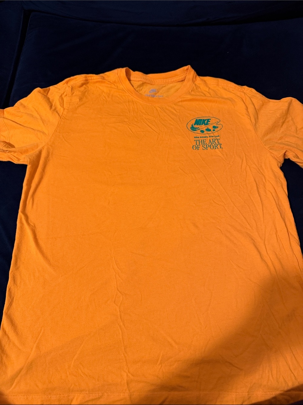 Nike Men’s Orange Short Sleeve 'The Art of Sport' Graphic Tee
